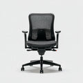 Sedia da ufficio ergonomica nera con schienale in rete 64 x 64 x 112-122 cm